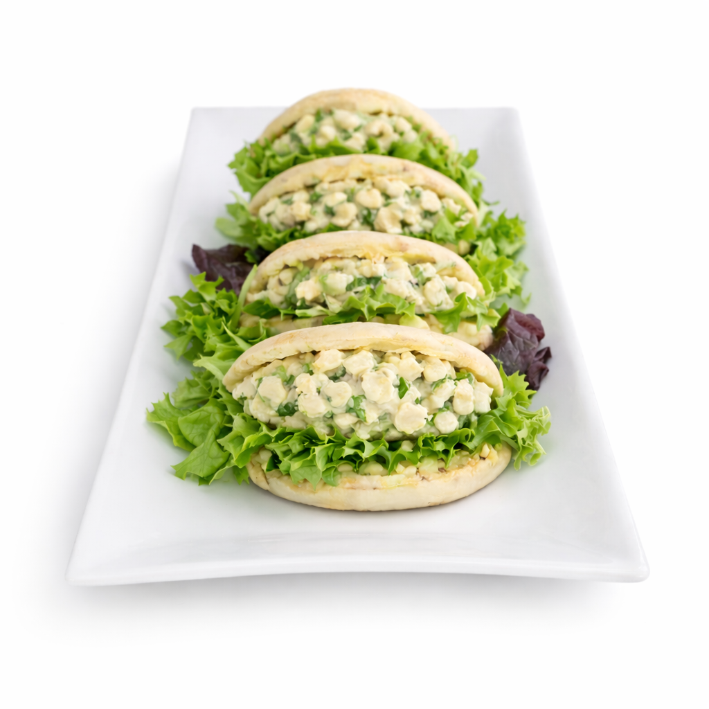 Chicken mayo cocktail pitas with lettuce and creamy chicken filling, three on tray