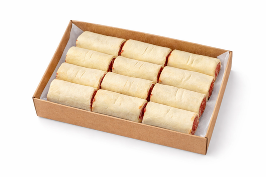 Frozen sausage rolls in a cardboard tray