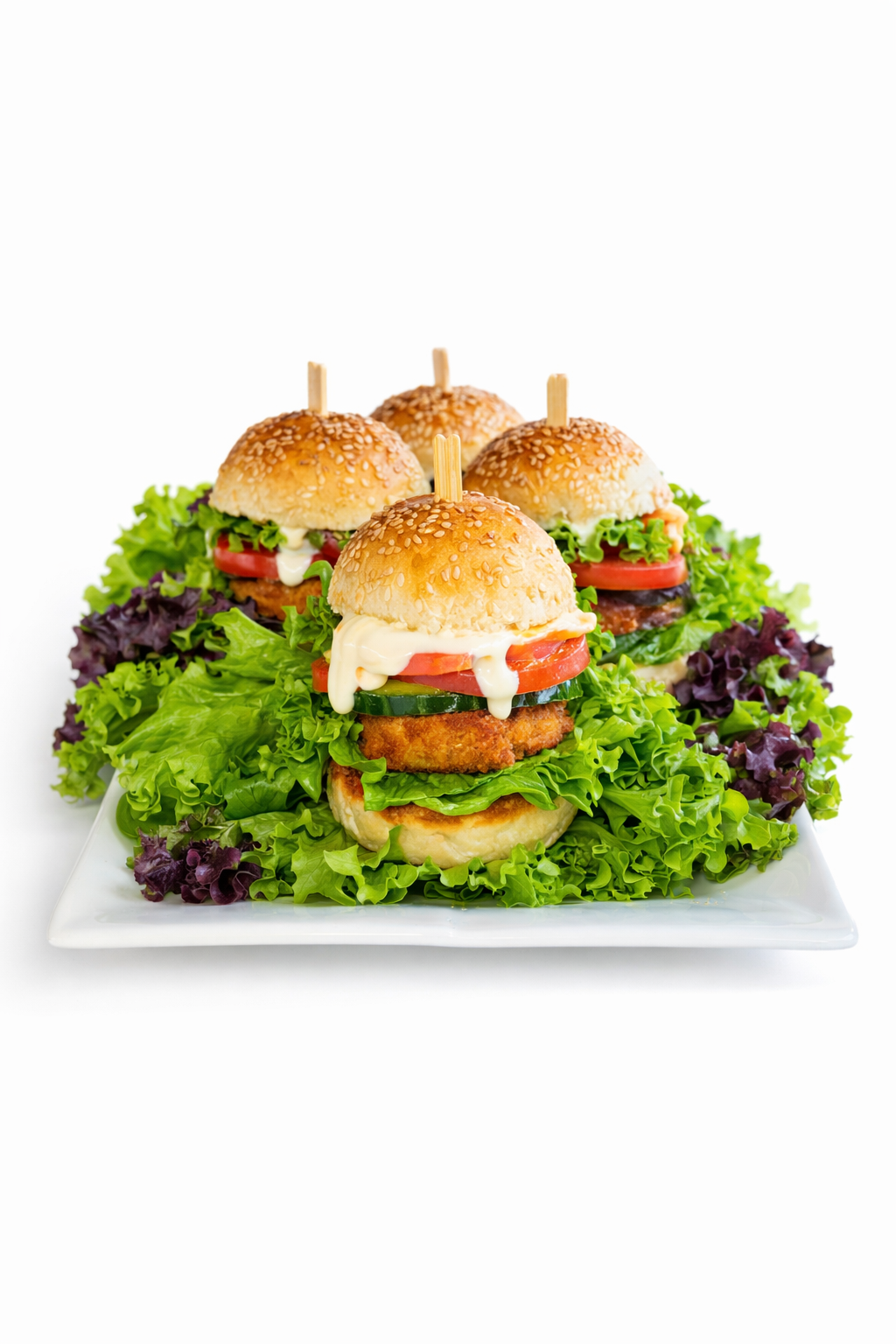 Chicken Slider: four mini burgers with sesame buns, lettuce, tomato, cheese and chicken