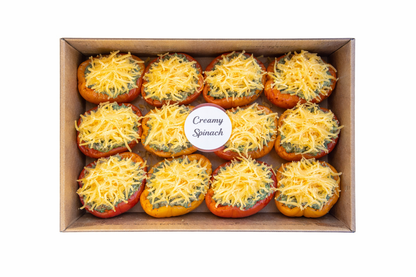 Frozen pizzas in a box, Creamy Spinach flavour, topped with shredded cheese