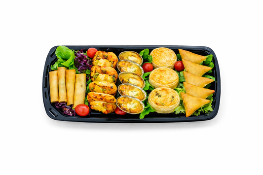 Half vegetarian platter with samosas, vegetable filling, lettuce and cherry tomatoes