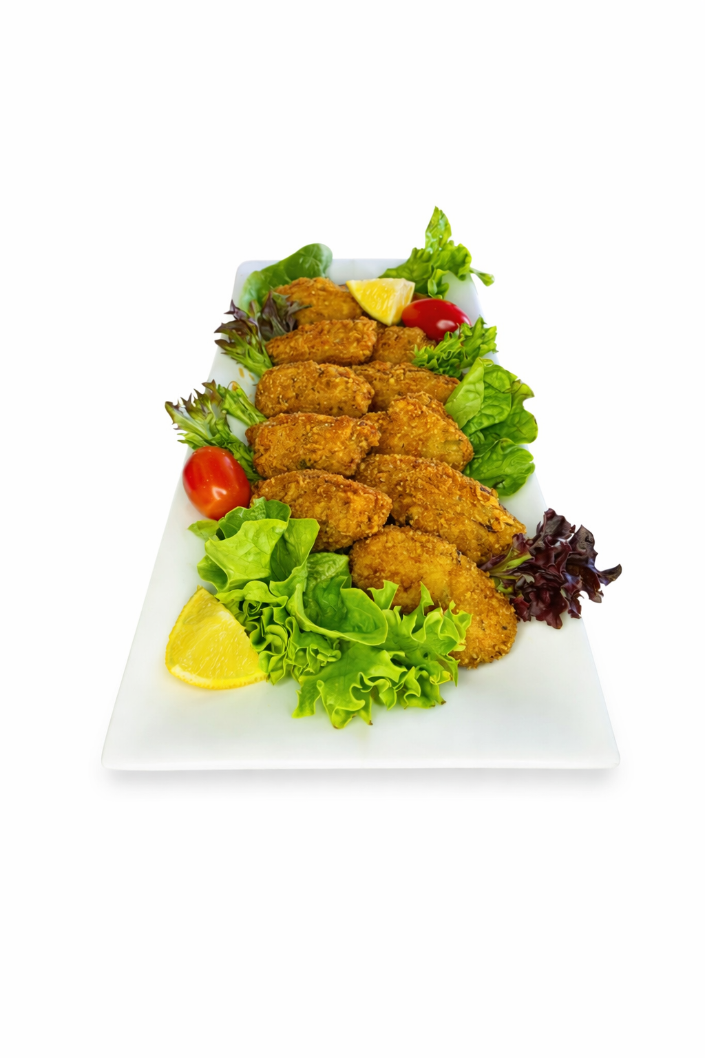 Deep Fried Crumbed Wings on a platter with lettuce, lemon wedges, and tomato